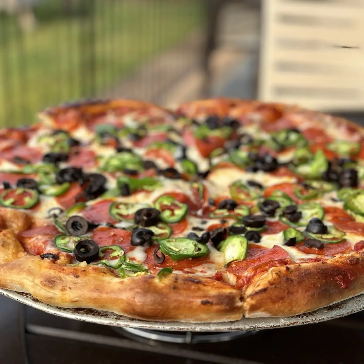 Pepperoni Jalapeño and Black Olive Pizza