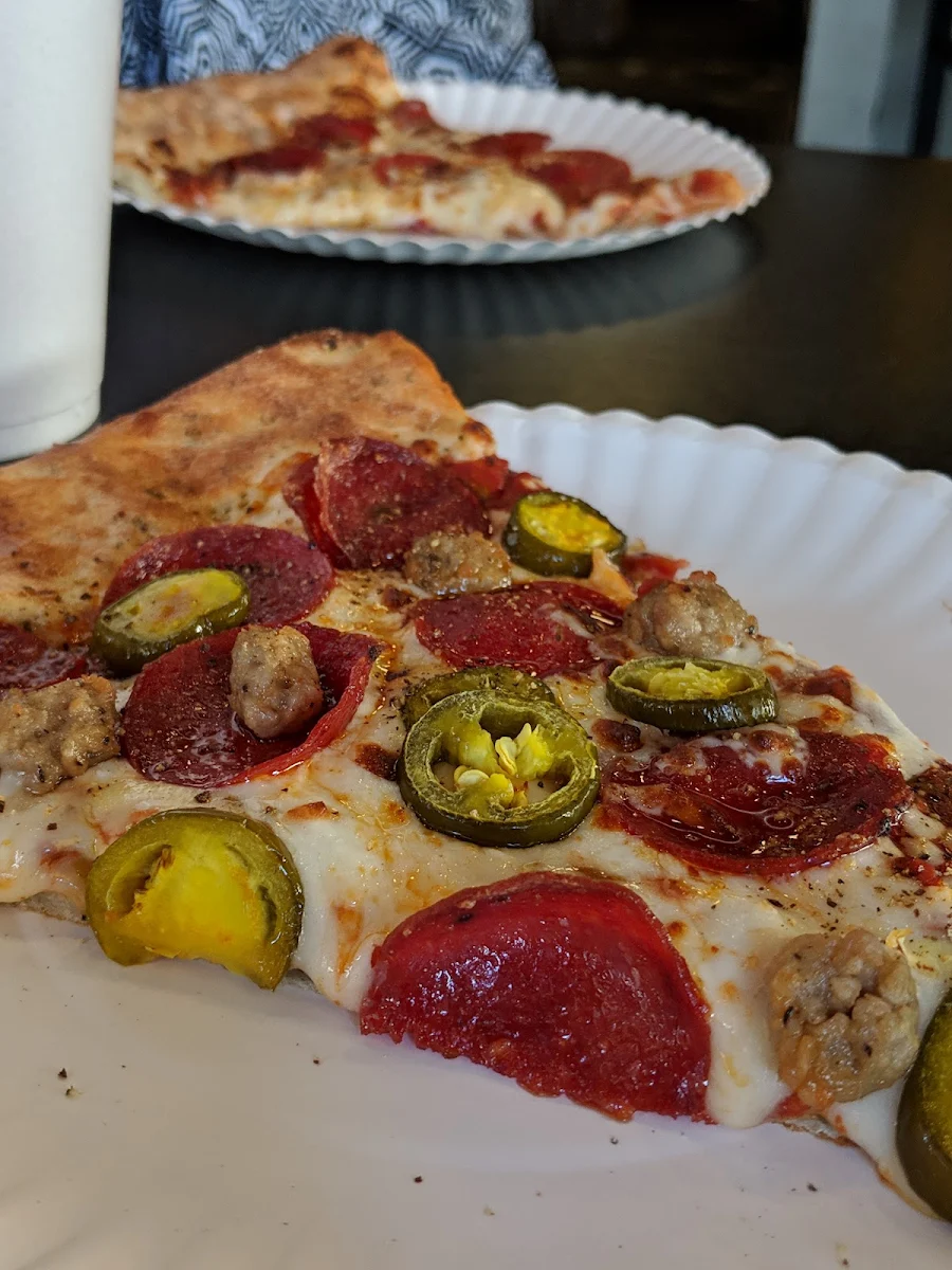Pepperoni and Sausage Pizza Slice with Jalapenos