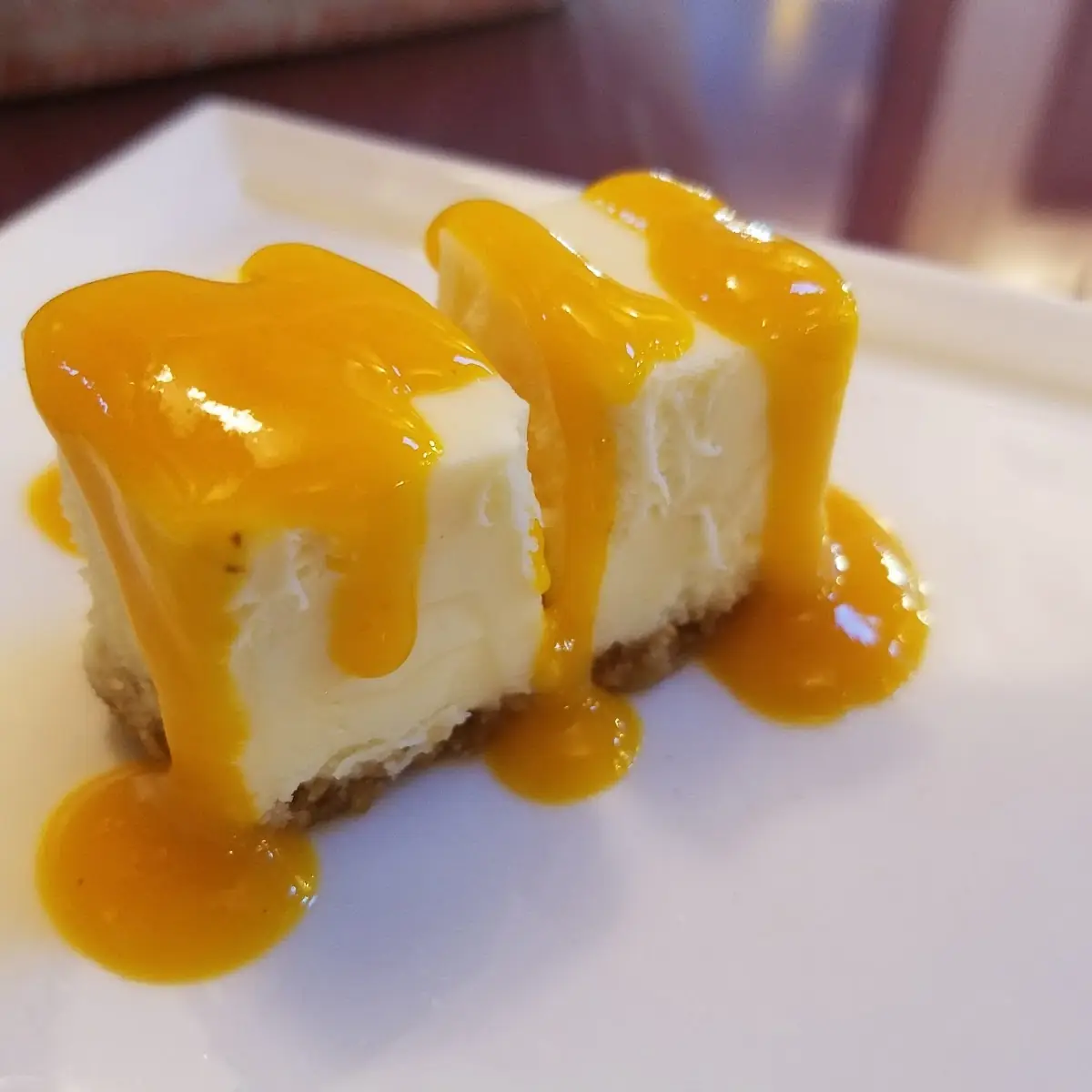 New York Style Cheesecake with Mango Sauce