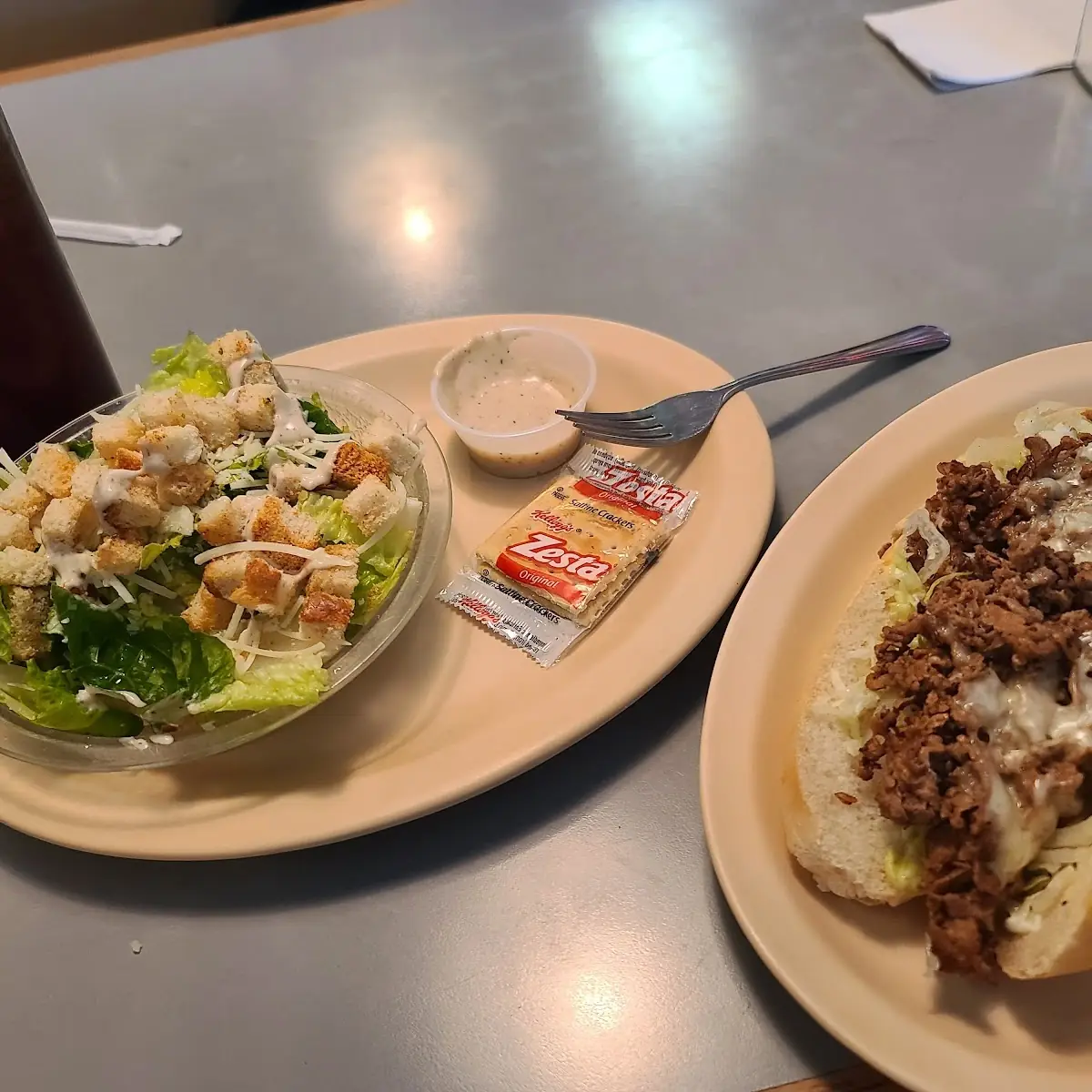 Steak and Cheese Sub and Caesar Salad