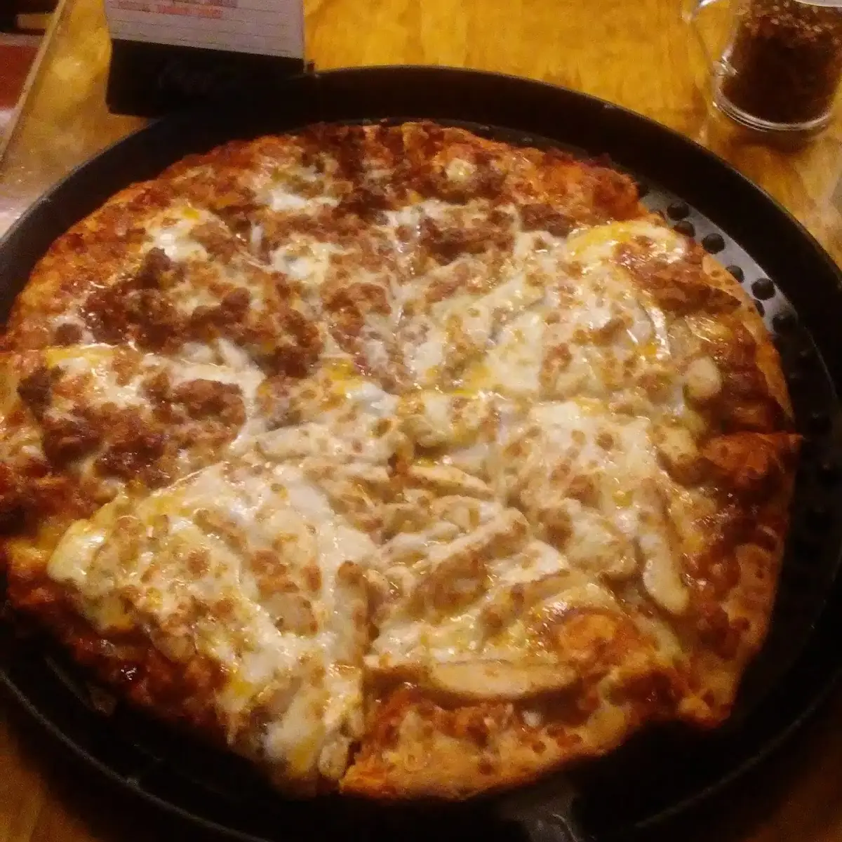Half Bacon Cheeseburger Half BBQ Chicken Pizza