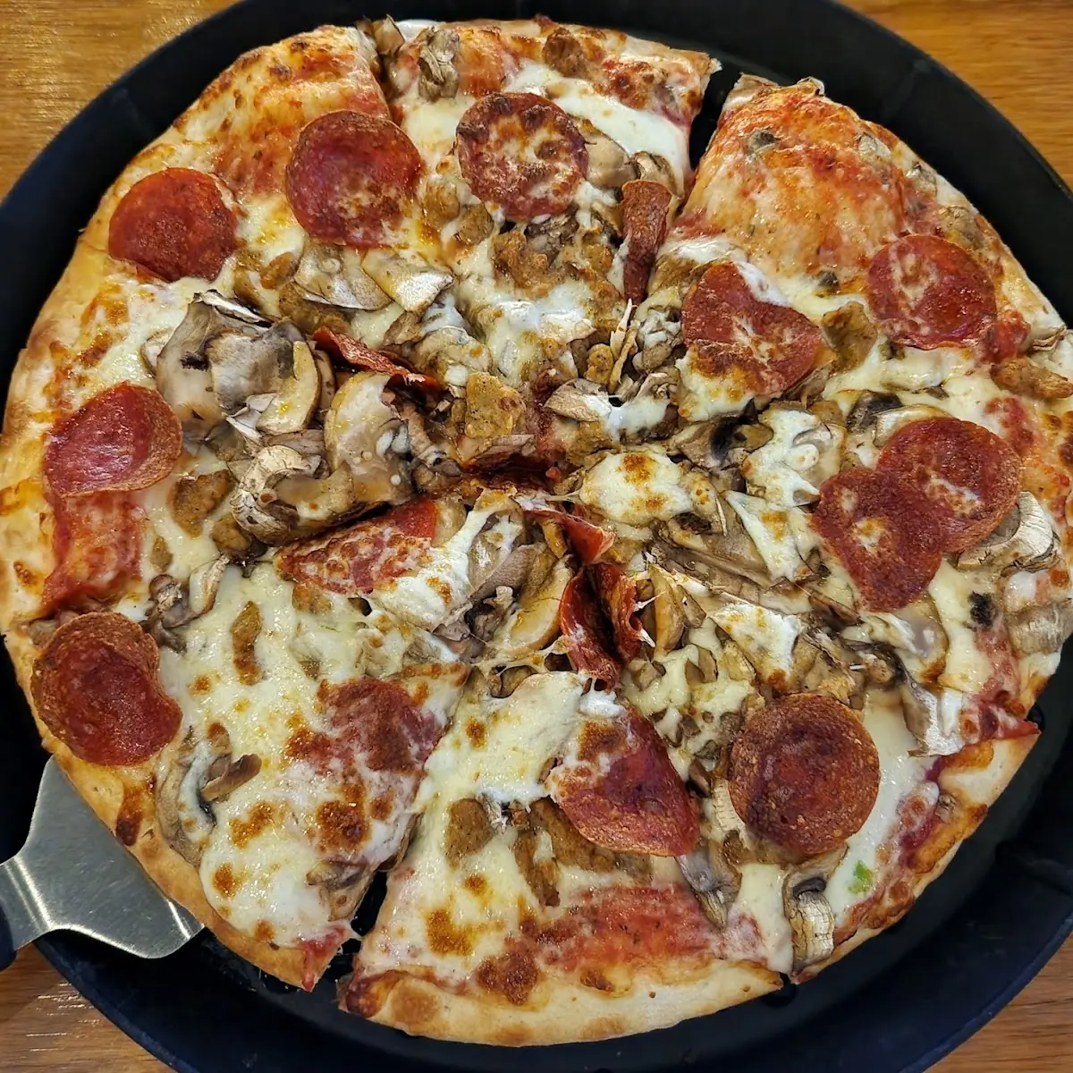Pepperoni Mushroom and Sausage Pizza