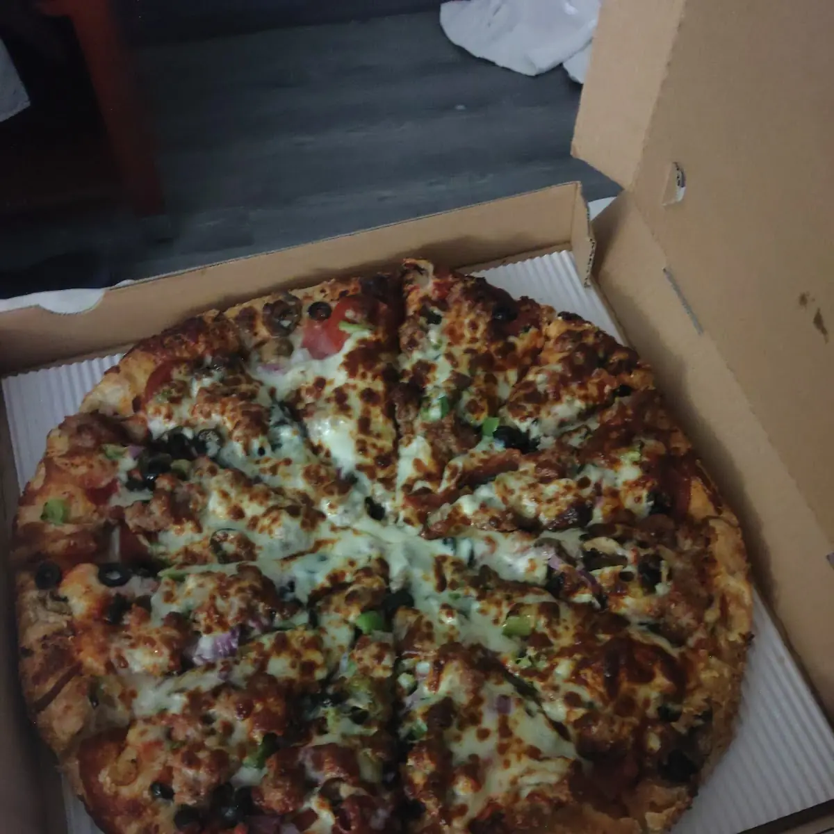 Super Supreme Deluxe Pizza