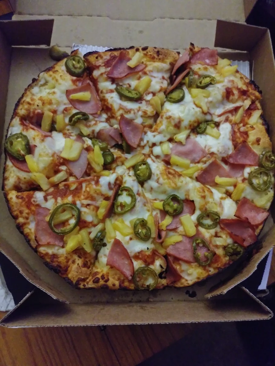 Arrived Hot Pan Pizza with Ham Pineapple and Jalapenos the Other Is Pepperoni