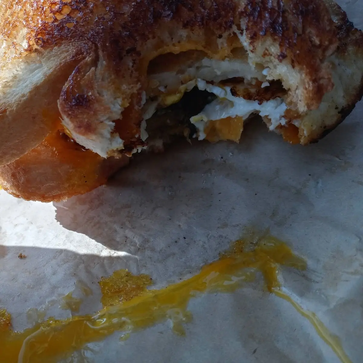 Grilled Cheese with Burger Hash Brown and a Runny Egg