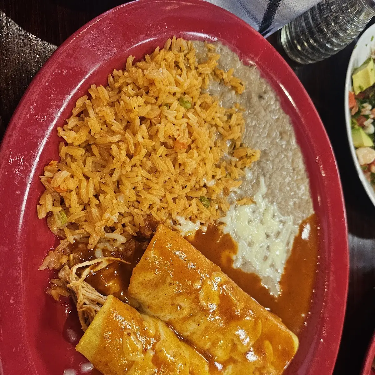 2 Enchilada Tamal Rice and Refried Beans
