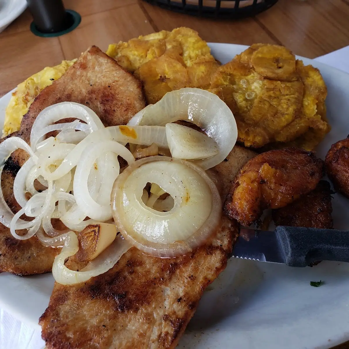 Pork with Tostones and Grilled Onions
