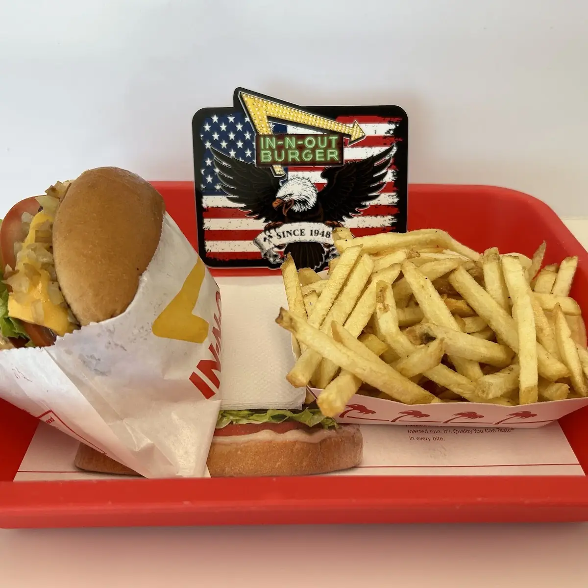 Cheeseburger with Double Lettuce and Tomato and Grilled Onions