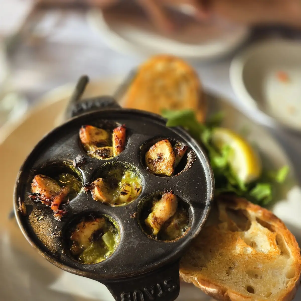 Escargot with Toasted Bread and Lemon