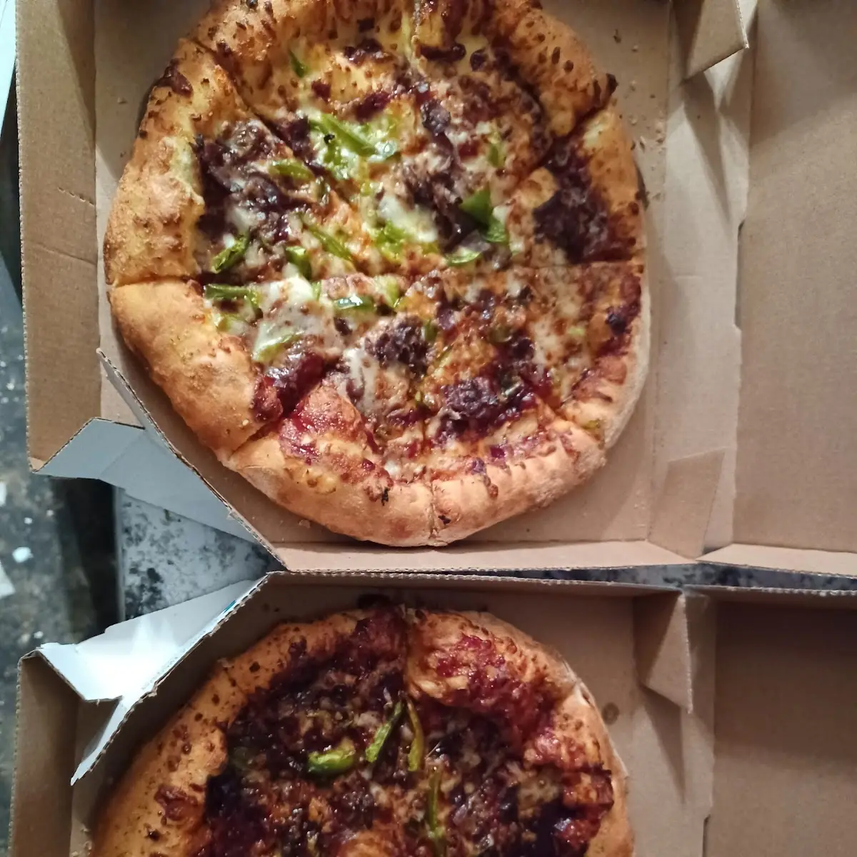 They Are Both a Steak and Green Pepper Pizza
