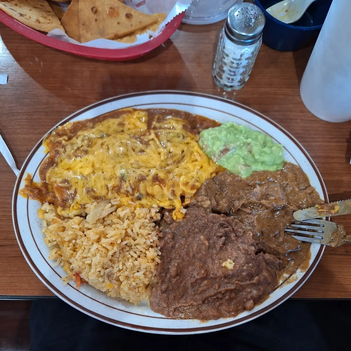Enchilada and Carne Guisada Plate