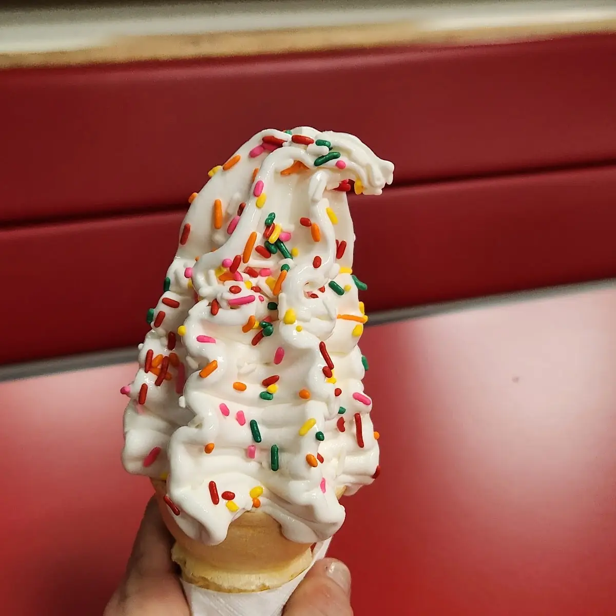 Vanilla Ice Cream Cone with Colored Sprinkles