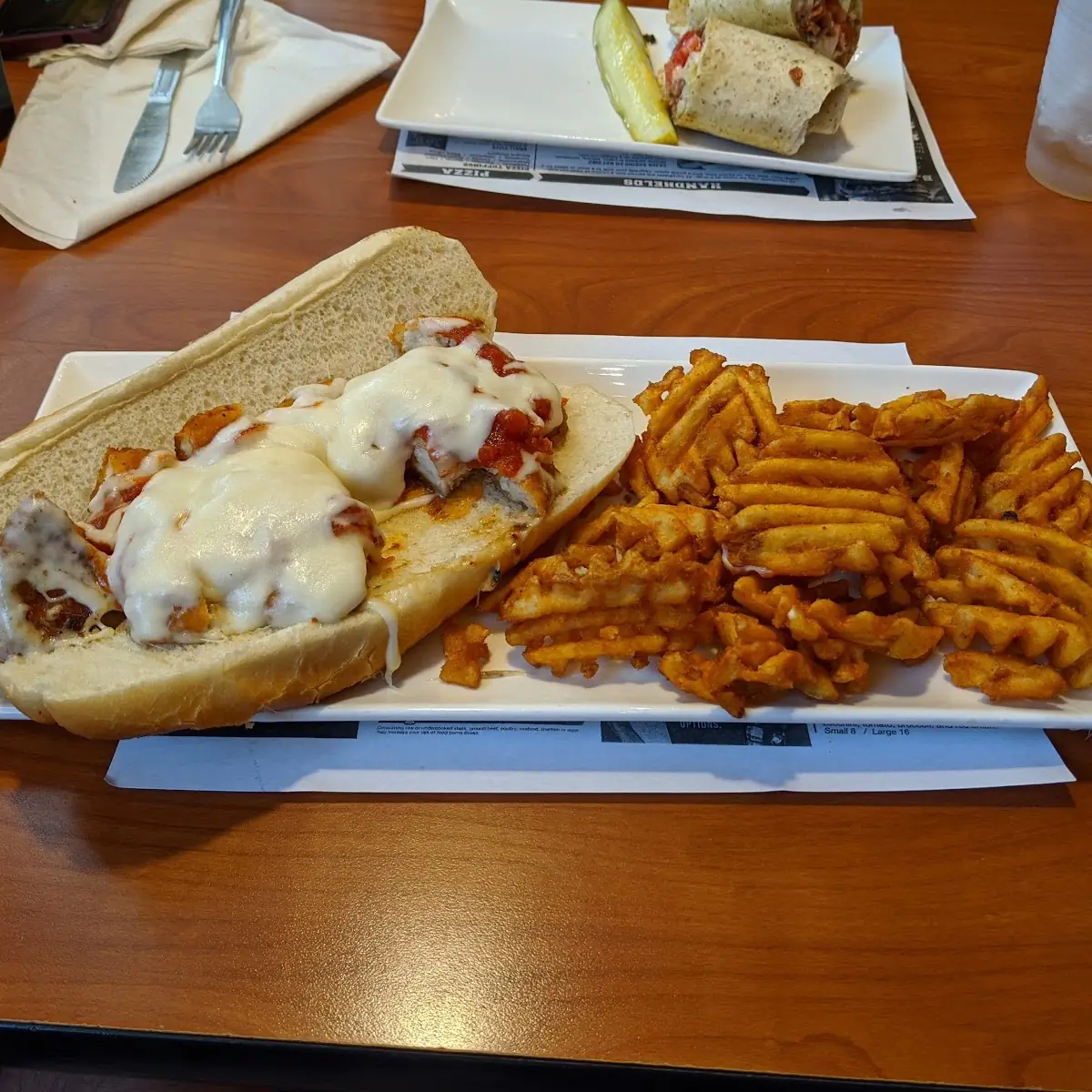 Chicken Parm Handheld and Waffle Fries