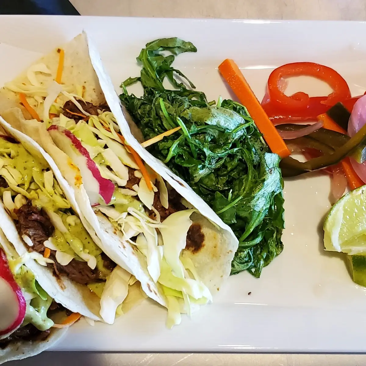 3 Birria Tacos with Arugula