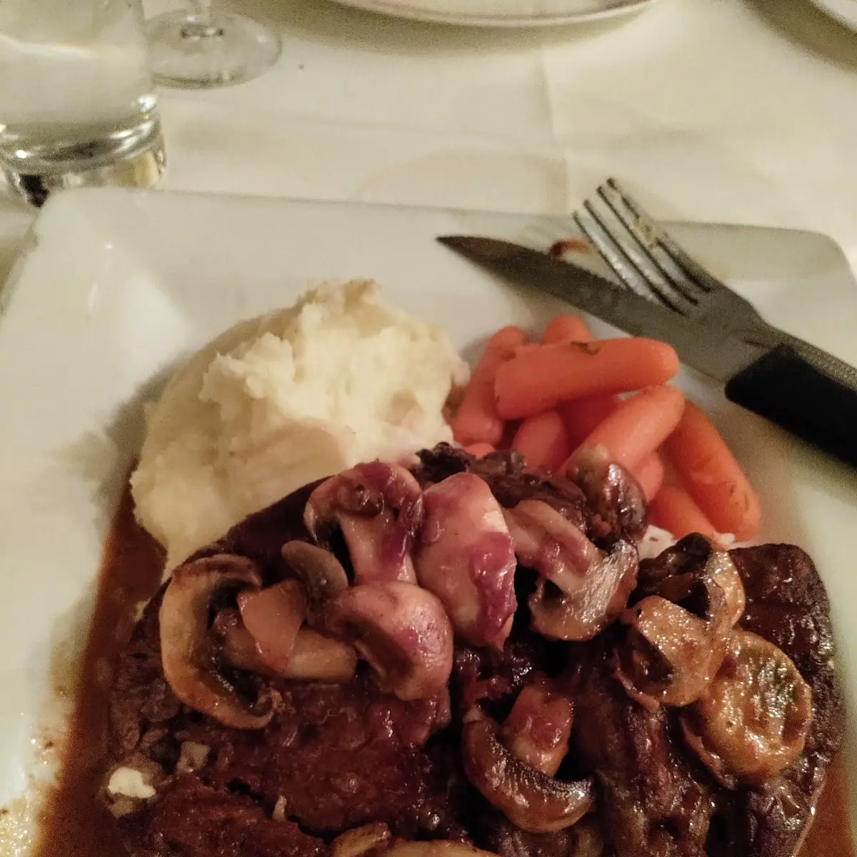 Beef Medallions with Mushrooms Mashed Potatoes and Steamed Carrots