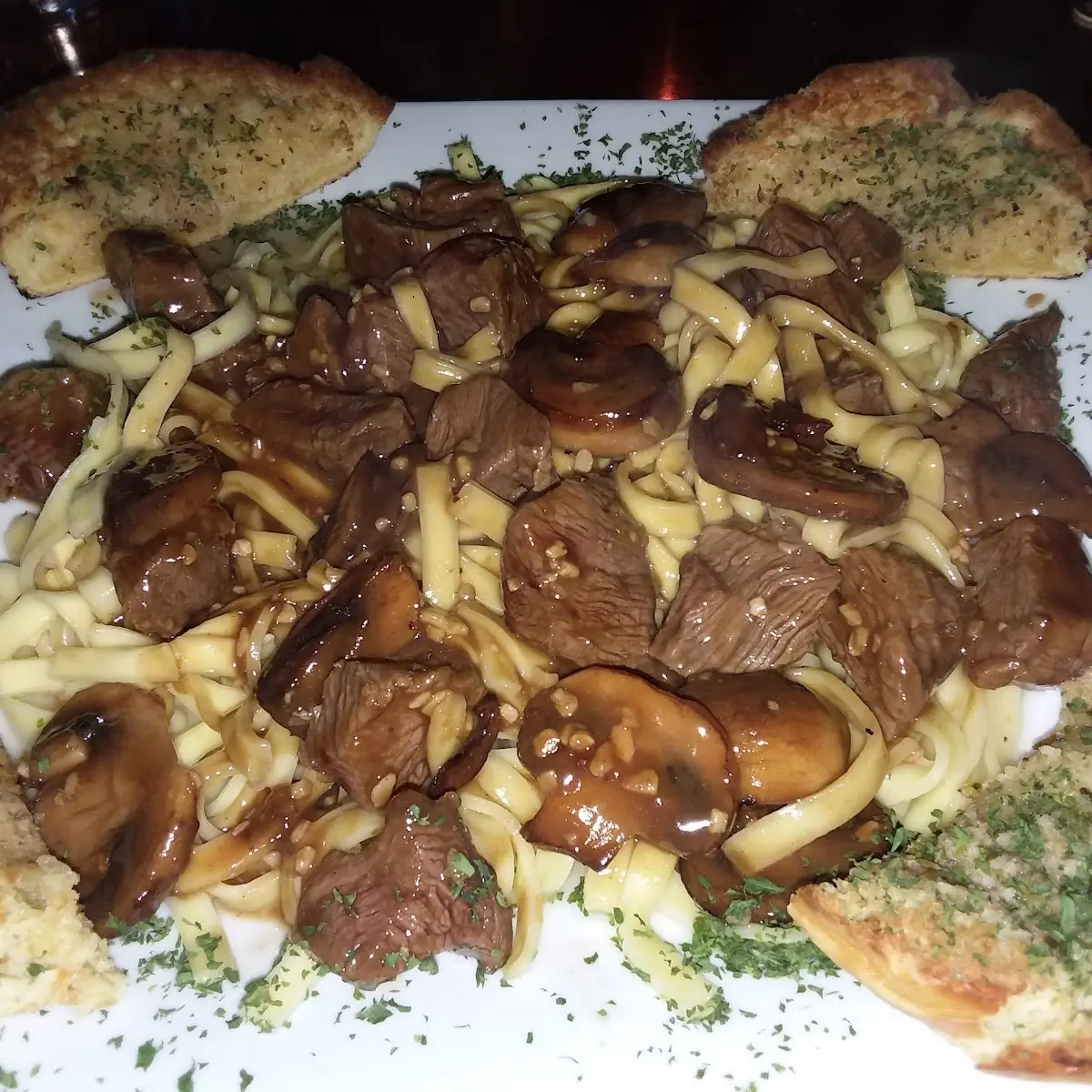 Steak Tips over Pasta with Mushroom Gravy