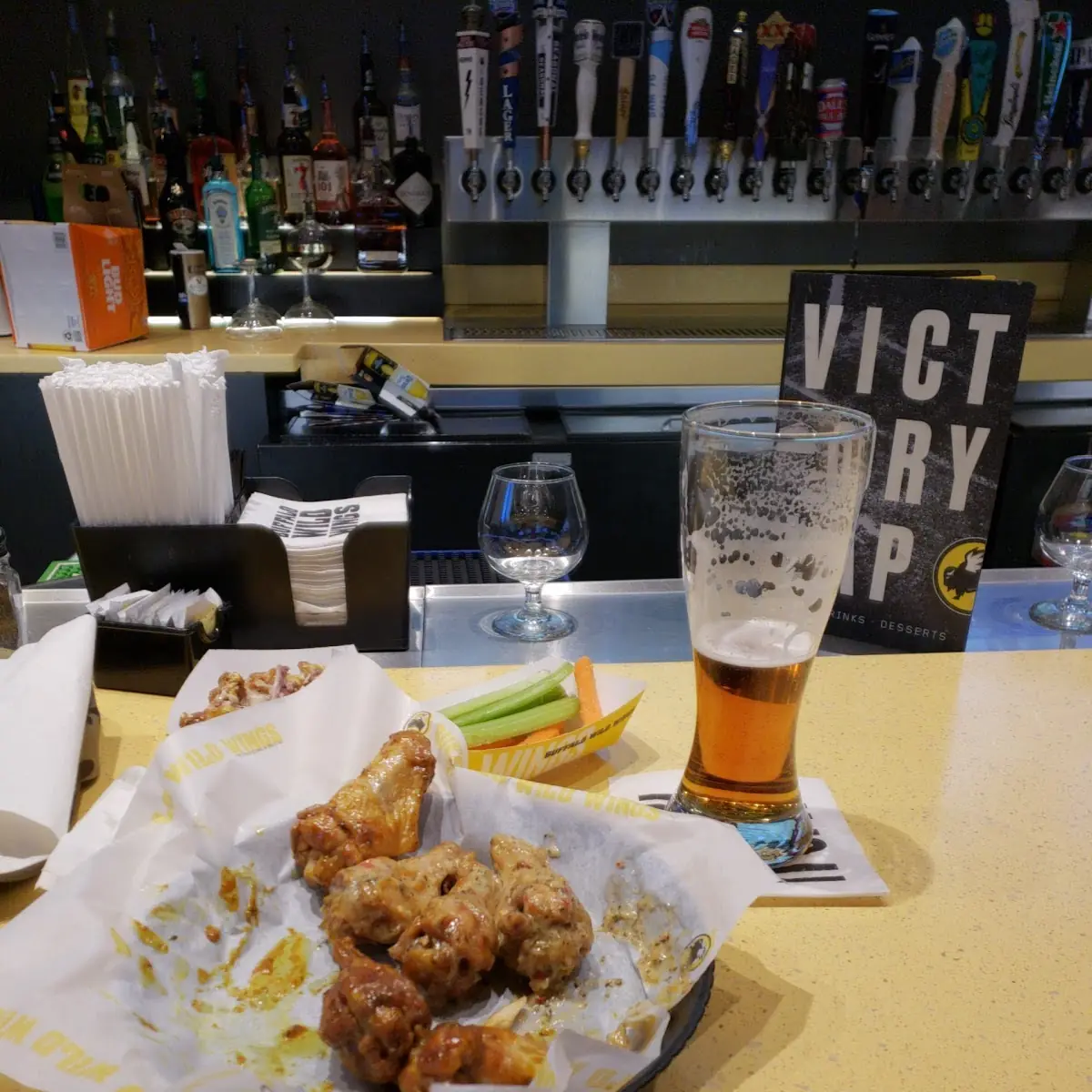 Wings and a Tall Yuengling Lager
