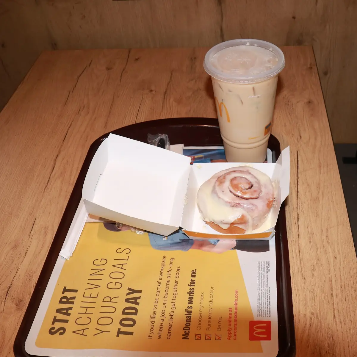 Cinnamon Roll and Large Caramel Iced Coffee