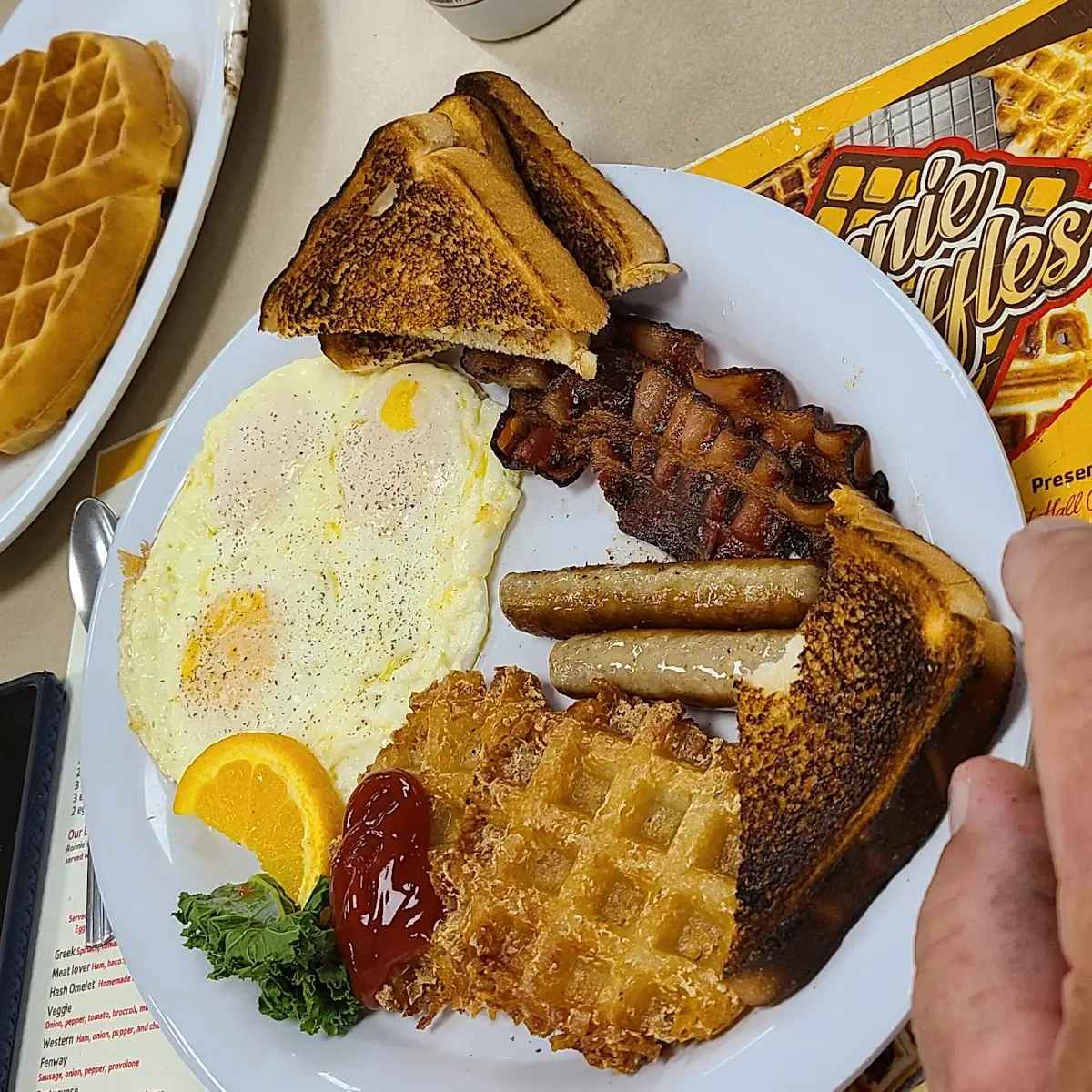 Eggs Bacon Sausage and White Toast
