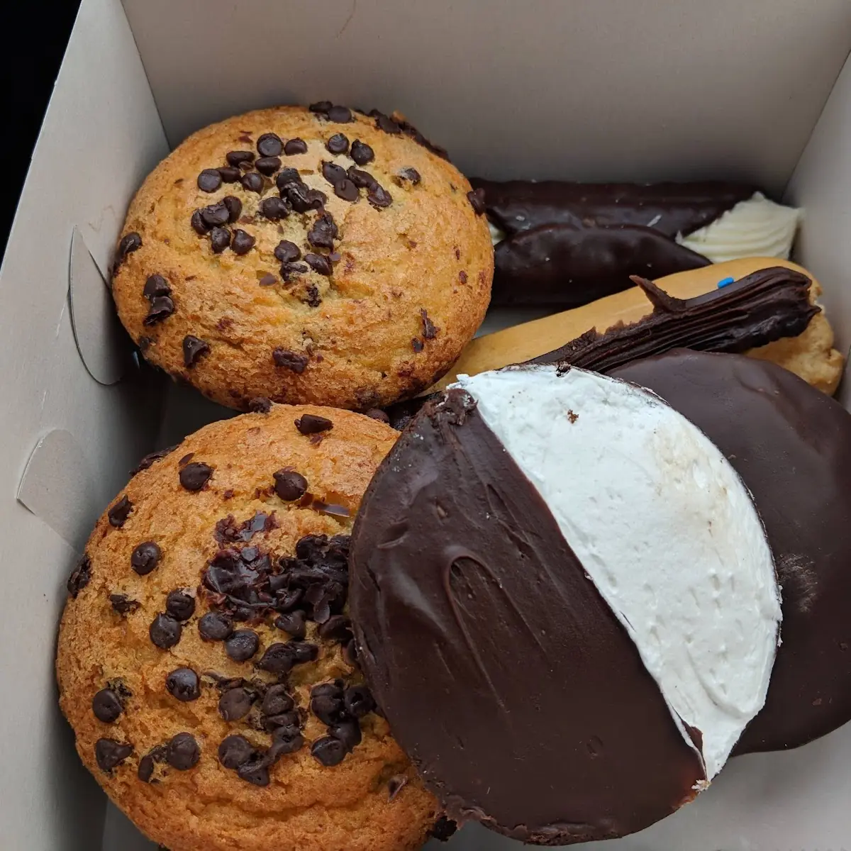 Chocolate Chip Muffins Chocolate Dipped Cannoli Eclair Half Moon Oreo Moons