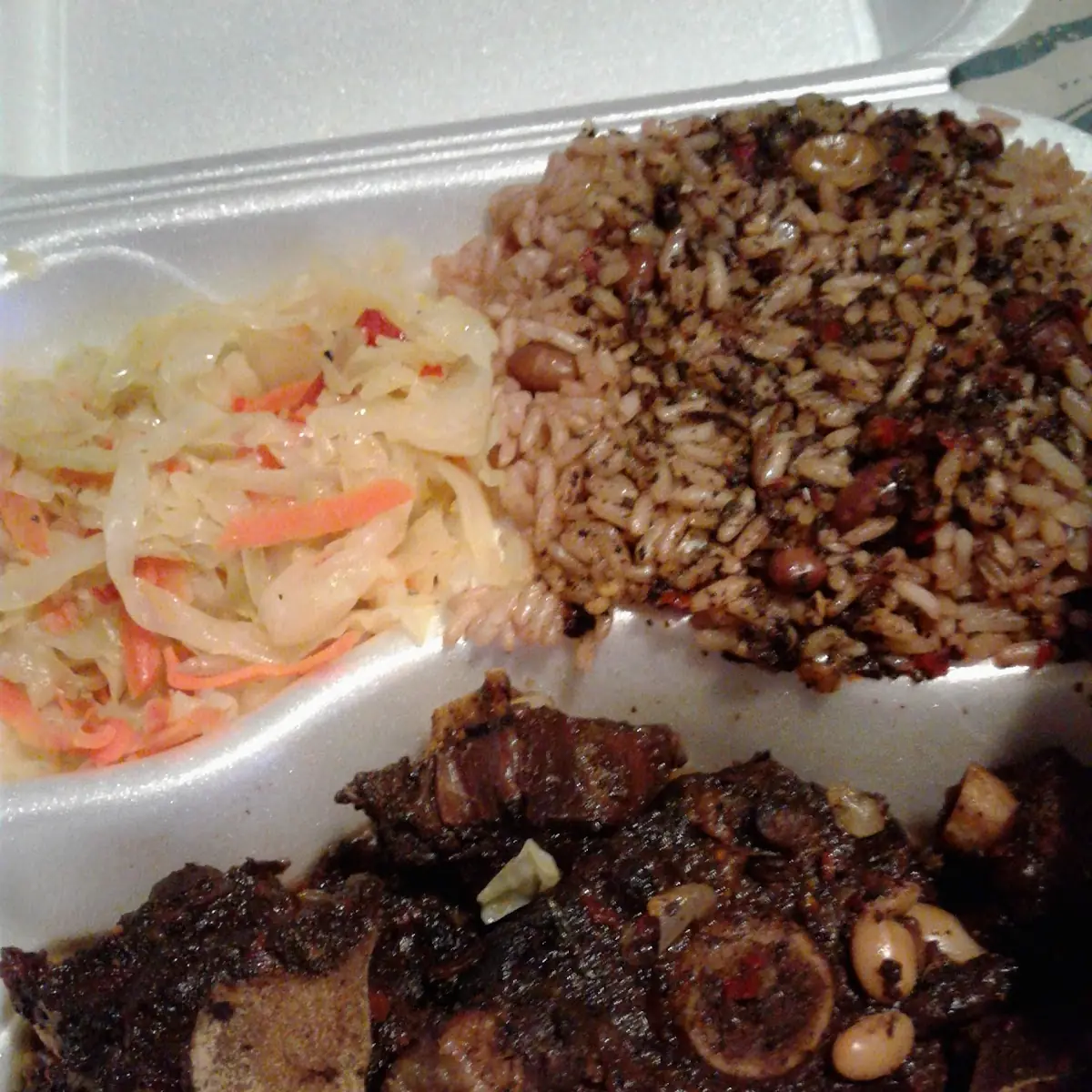 Oxtails with Cabbage and Rice & Peas