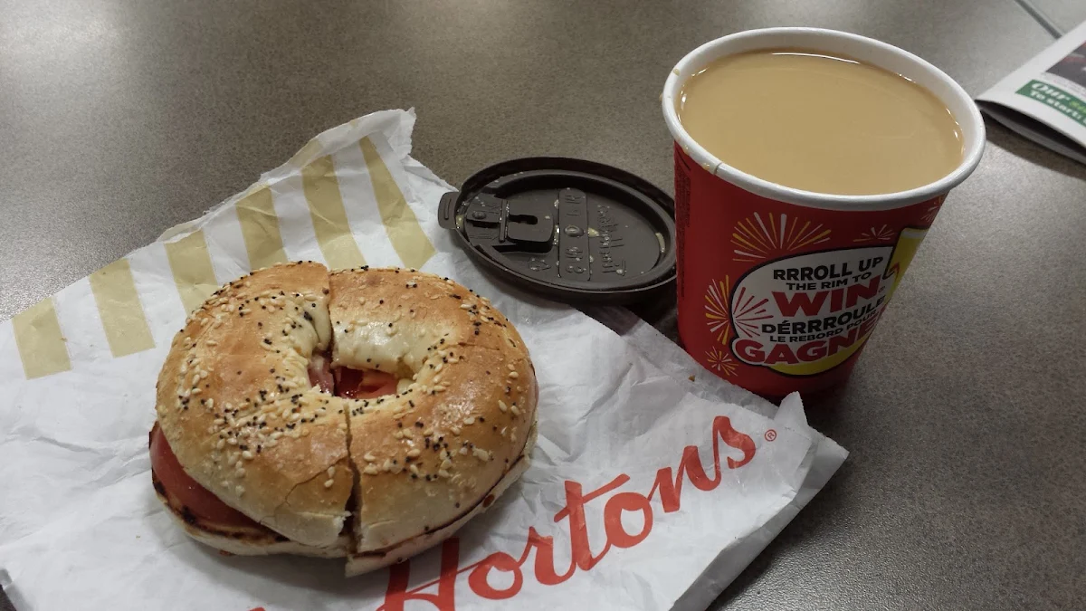 Small Coffee with Everything Bagel with Tomatoes