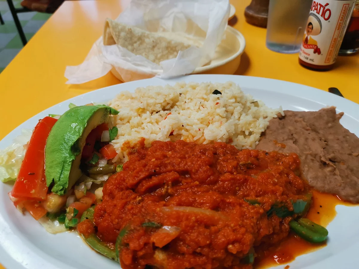 Bisteck Encebollado
