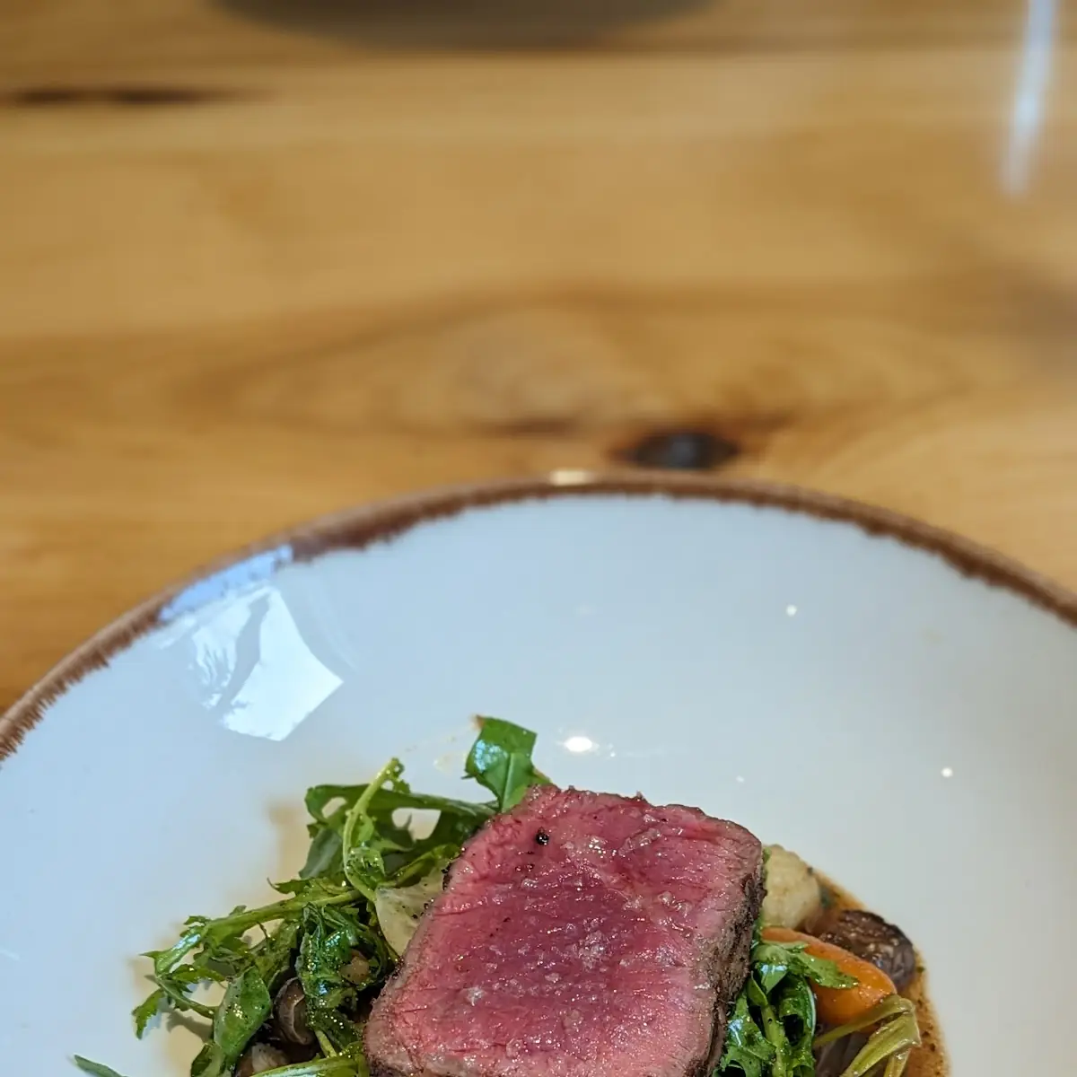 Medium Rare Steak and Greens Appetizer