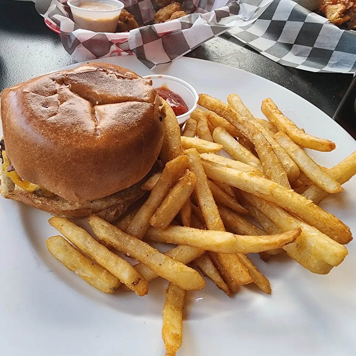 A Bacon Cheese Burger and Fries