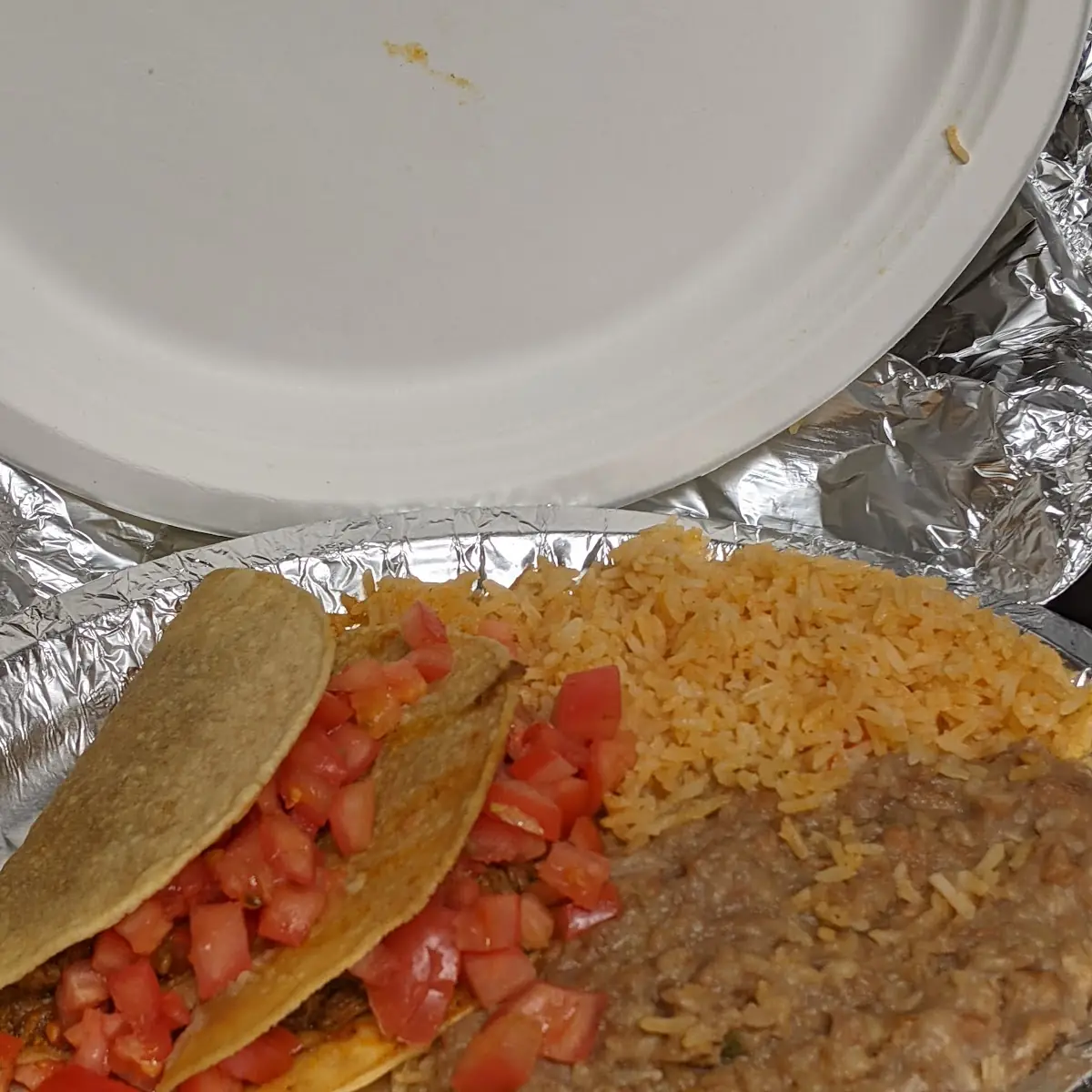 Crunchy Tacos with Extra Tomatoes