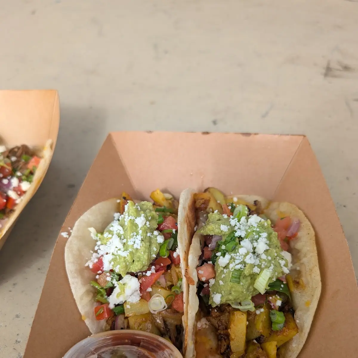 Yellow Curry Taco and Barbacoa Taco