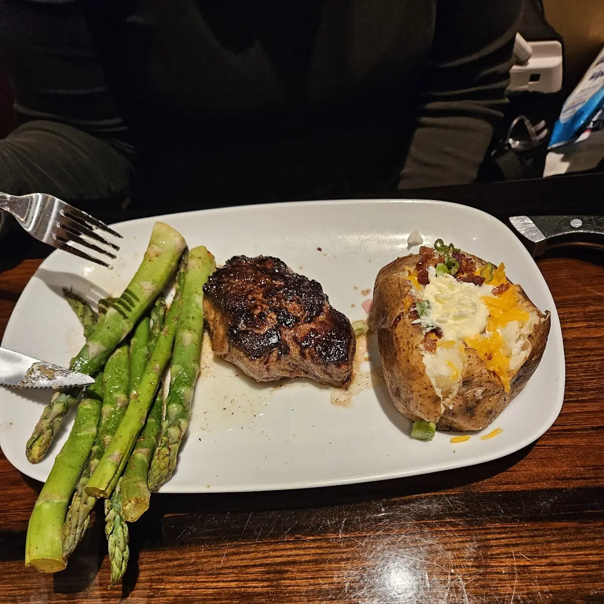 Outlaw Ribeye with Loaded Baked Potato