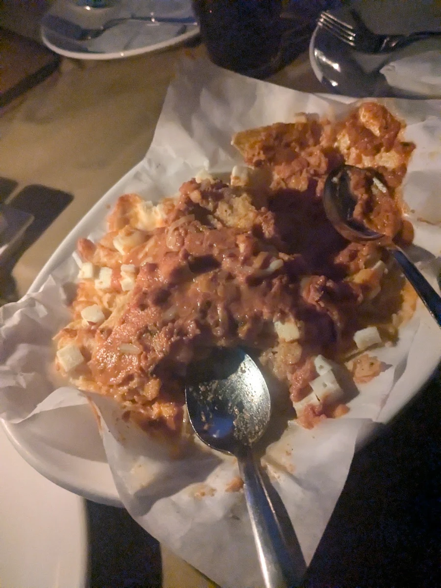 Butter Chicken Poutine, Apna Meats And Grill
