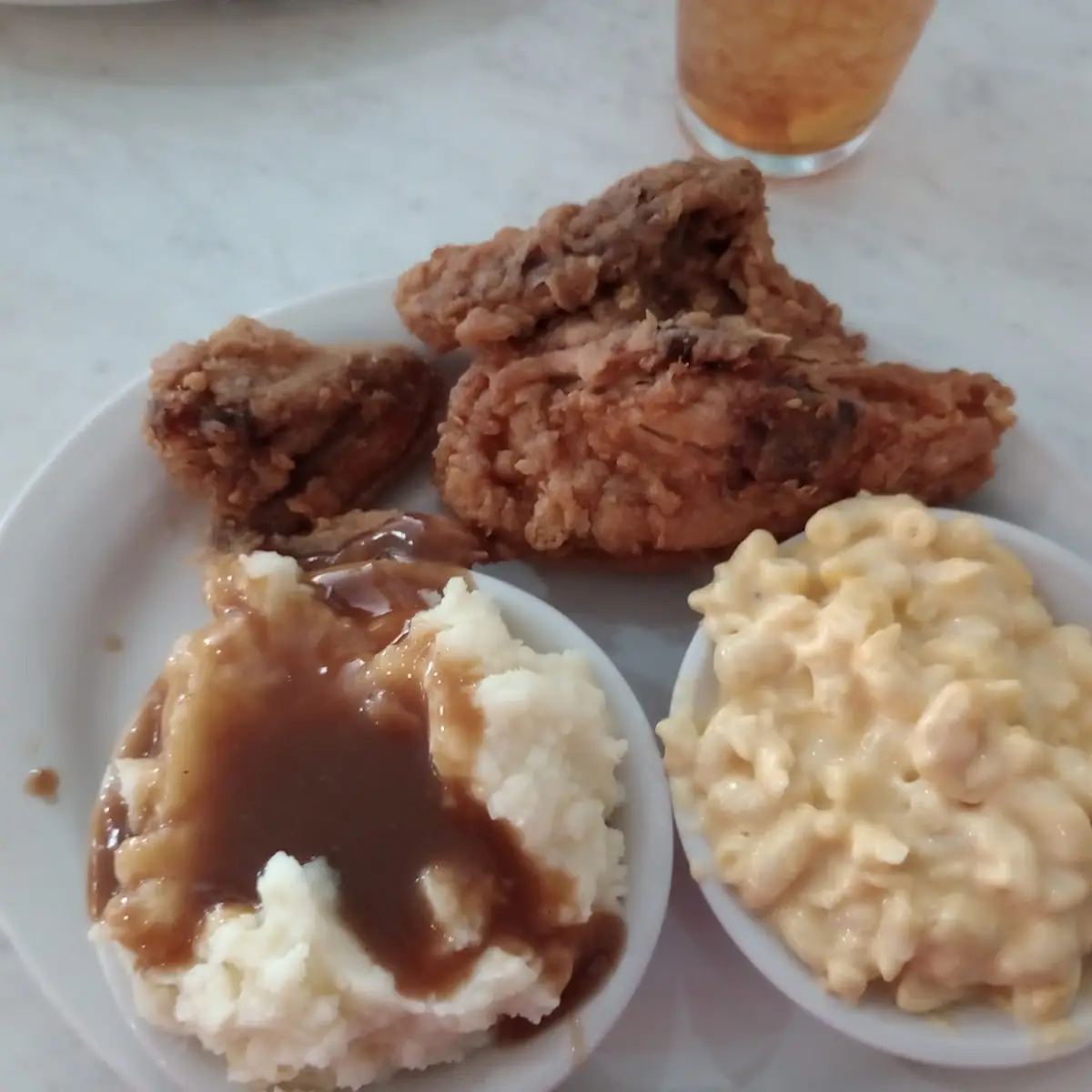 Fried Chicken with Mashed Potatoes and Gravy with Mac and Cheese