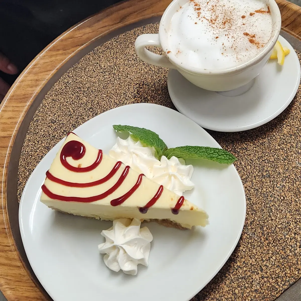 Creme Brulee Cheesecake with Raspberry Topping and Cappuccino