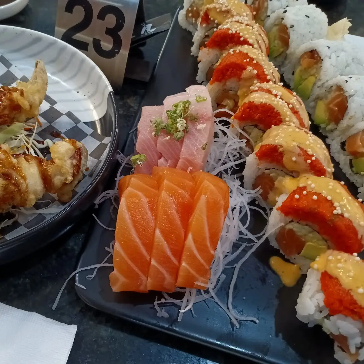 Cuttlefish Appetizer Left and Assorted Sushi Sashimi
