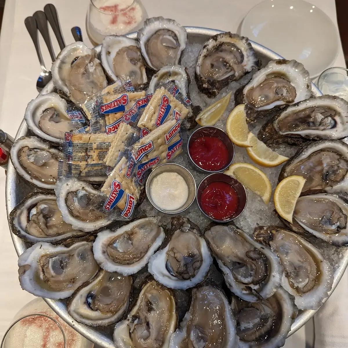 Raw Oysters with Lemon Wedges