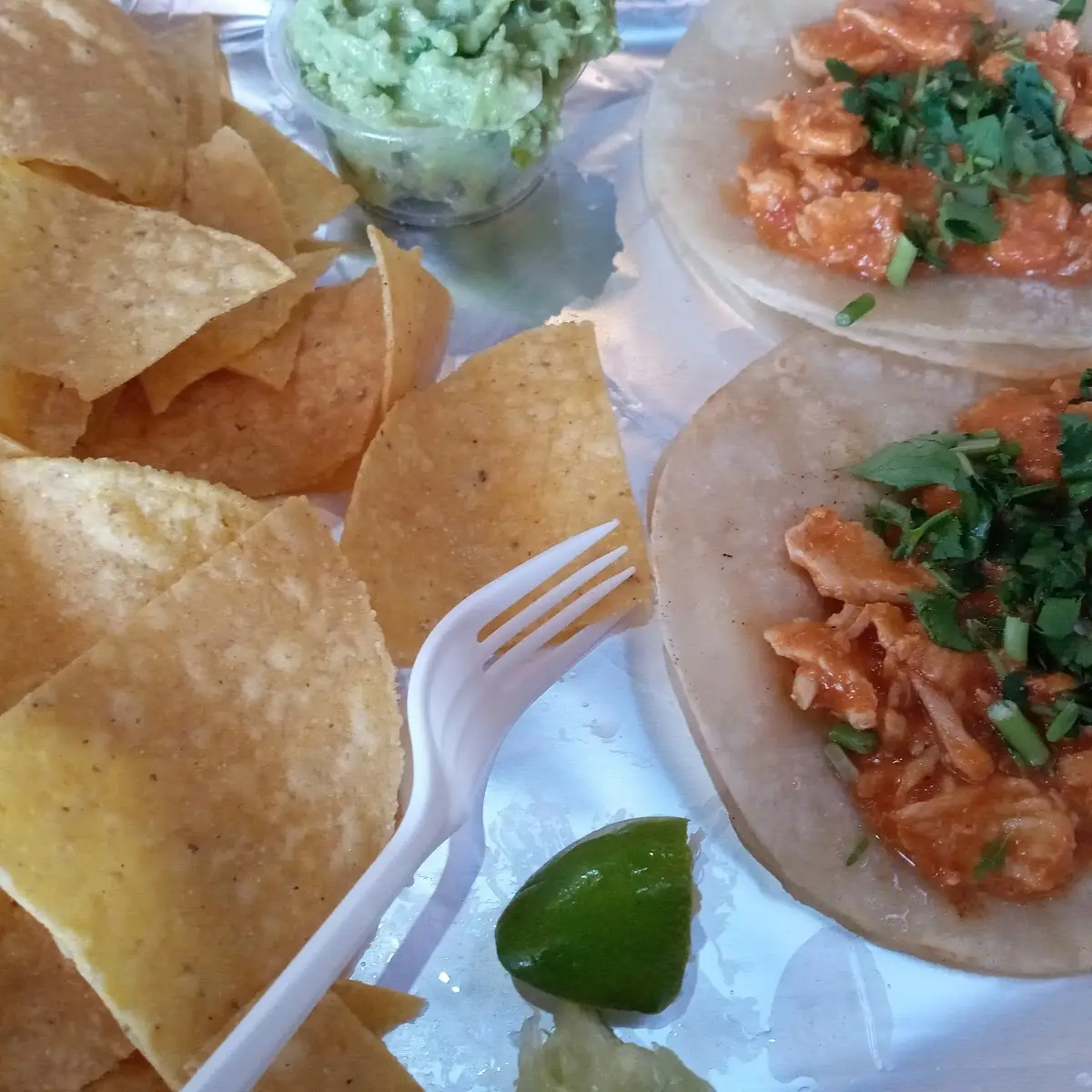 Chipotle Chicken Tacos Topped with Cilantro