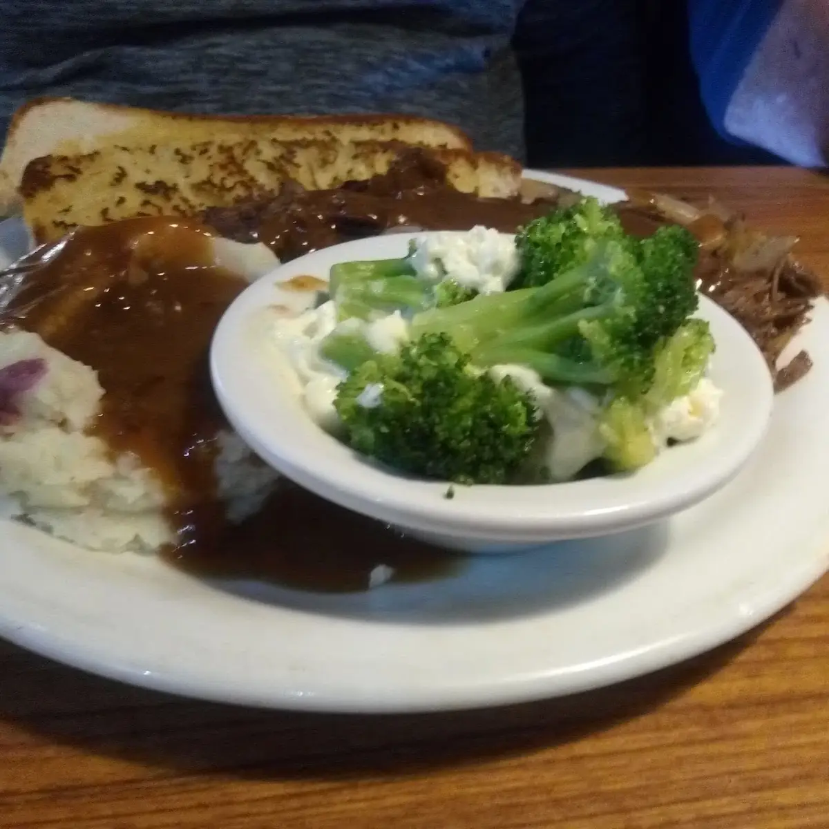 Pot Roast Mashed Potatoes and Gravy Well Done Broccoli and Garlic Bread