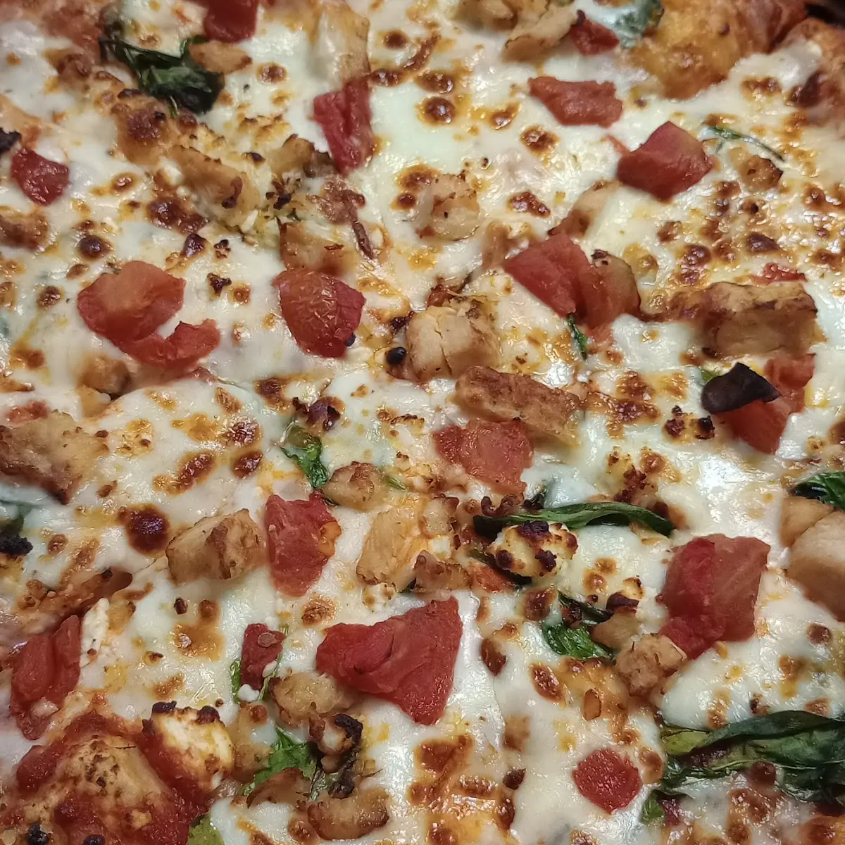 Chicken Spinach Tomato and Feta Pizza