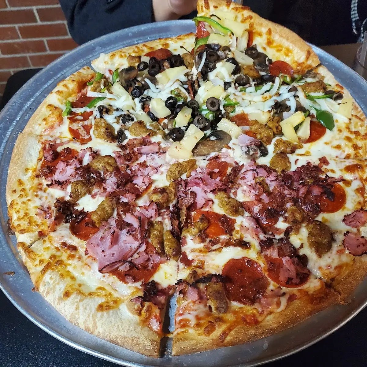 Half Supreme Pizza Half Meat Lovers Pizza