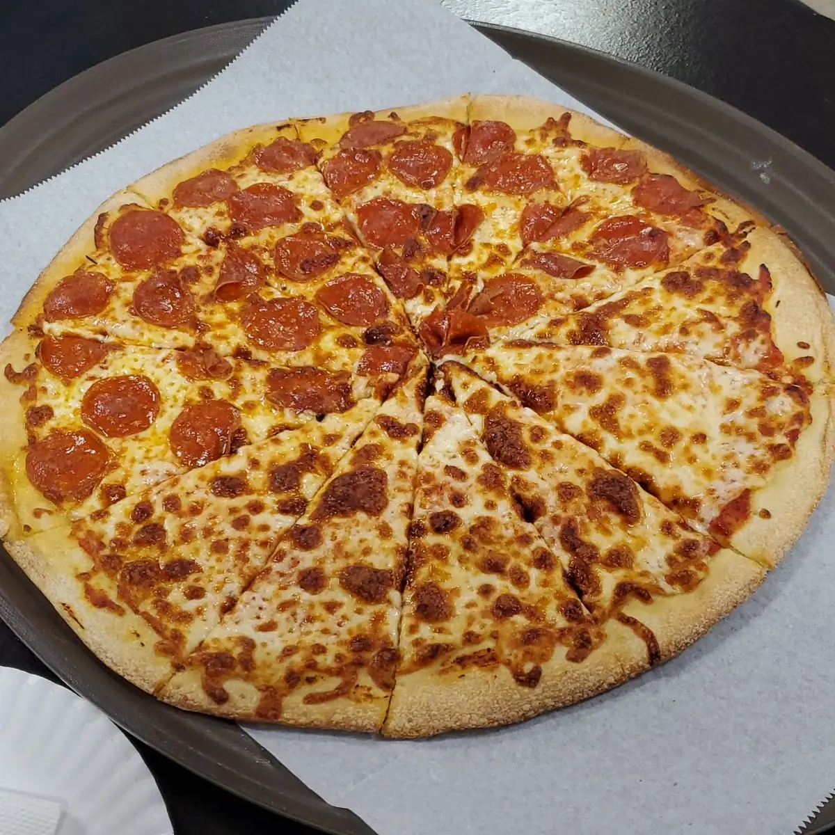 Half Pepperoni and Half Cheese Pizza