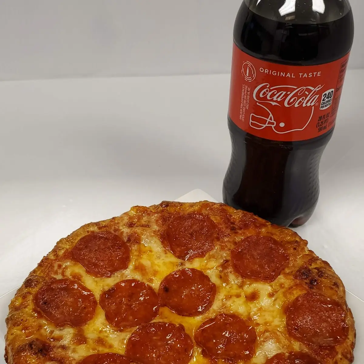 Personal Pizza and 20 Oz Pop