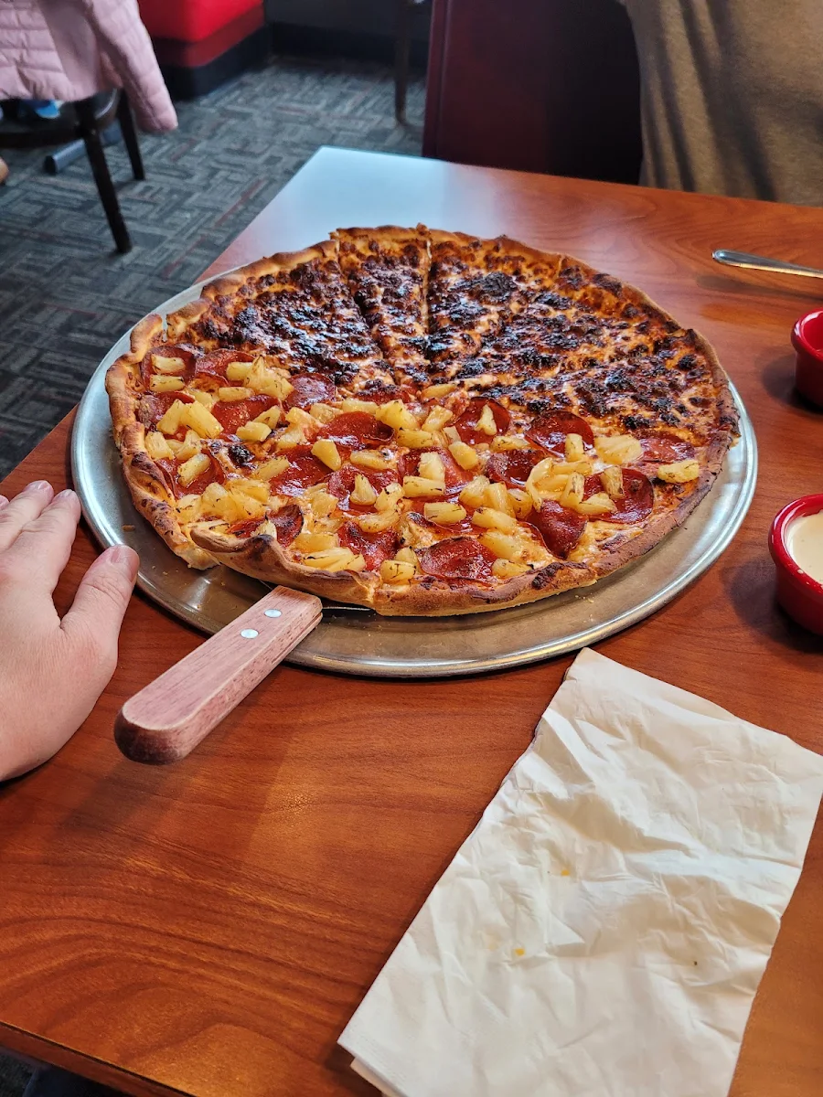 Half Cheese Pizza Half Pepperoni and Pineapple