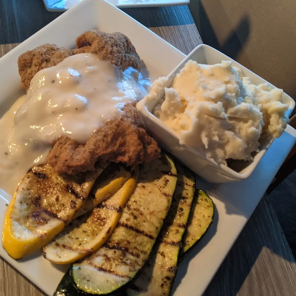 Country Fried Steak with Mashed Potatoes and Grilled Vegetables