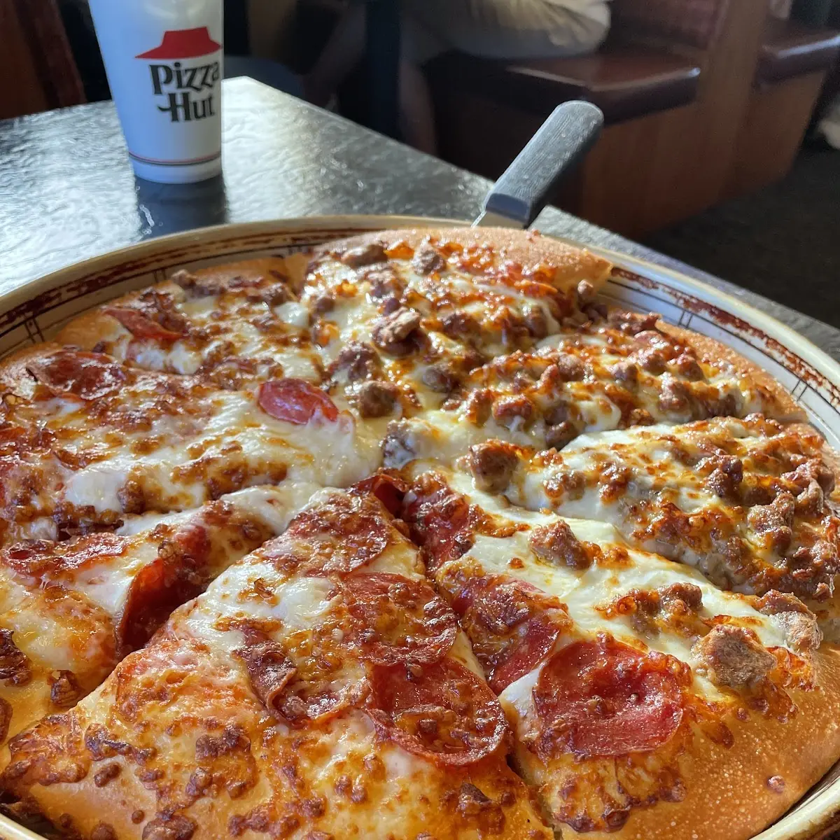 Half Pepperoni and Half Italian Sausage Pizza