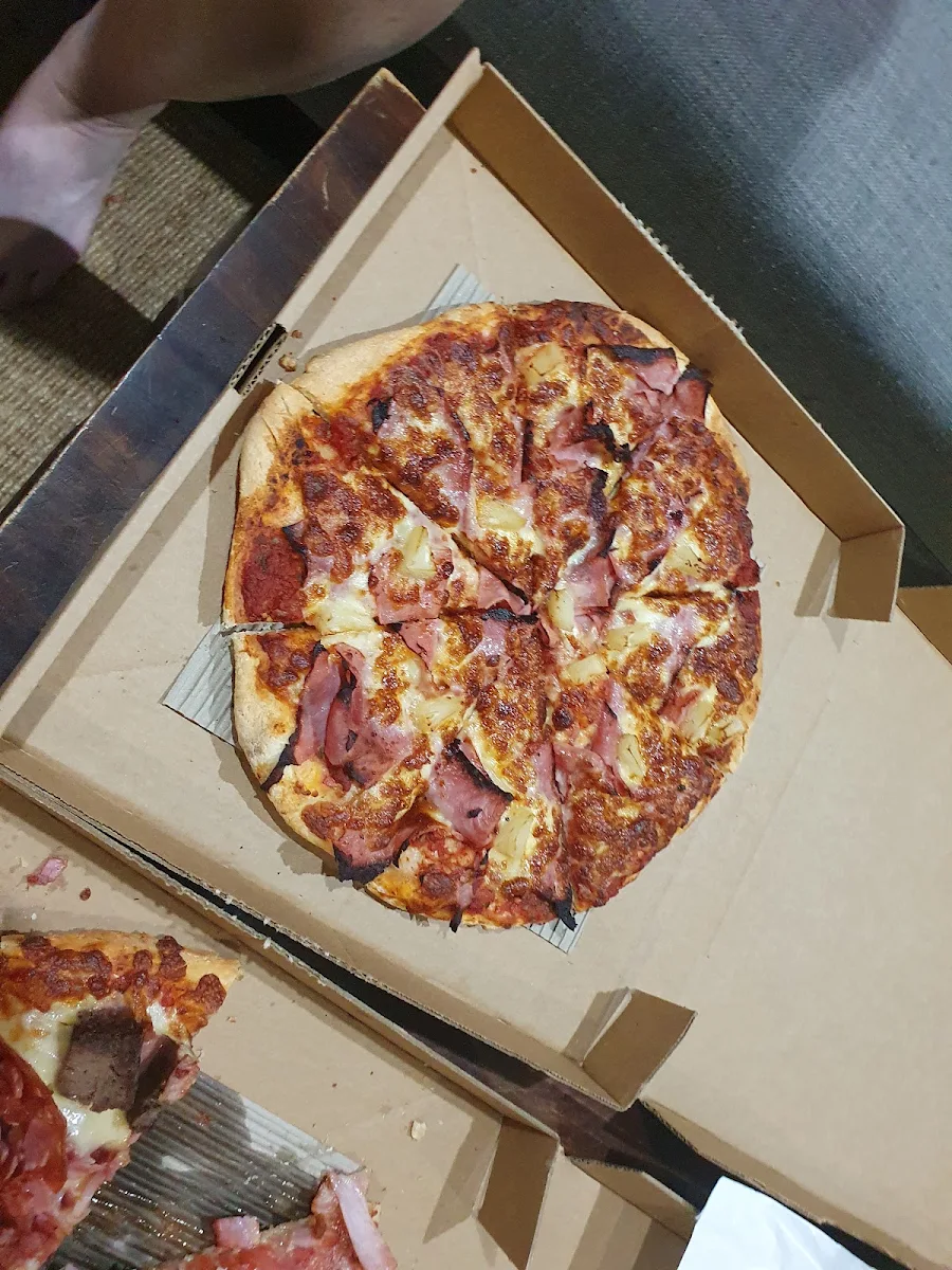 11 Carnivore Pizza Q, Mozzarella Fella Pizzeria