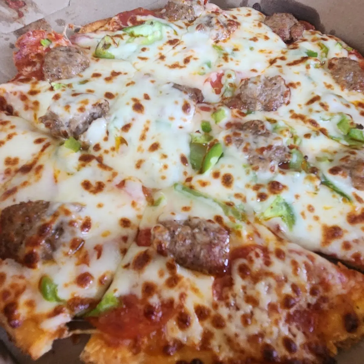 Thin Crust Sausage Pepperoni Green Pepper Pizza