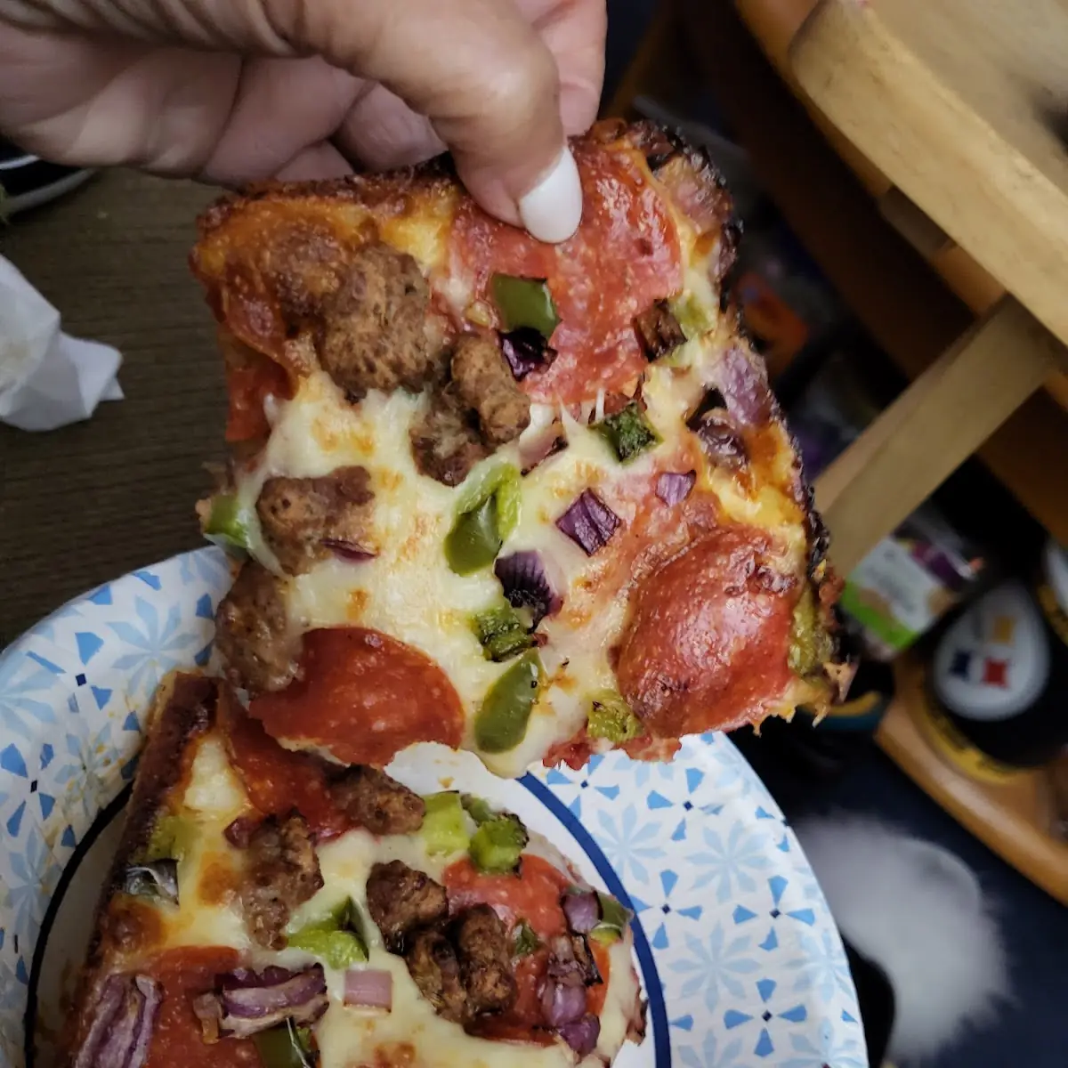 8 Corner Pizza with Sausage Pepperoni Pizza Slice