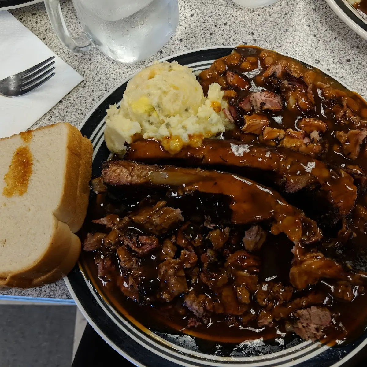 2 Meat Plate with Brisket Pulled Pork Beans and Potatoe Salad